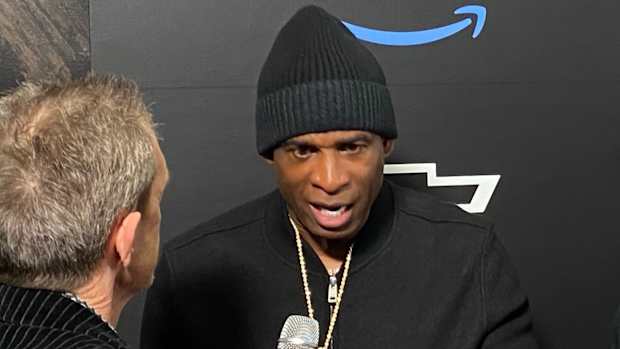 Deion Sanders talking to Mark McIntosh about mentoring youth